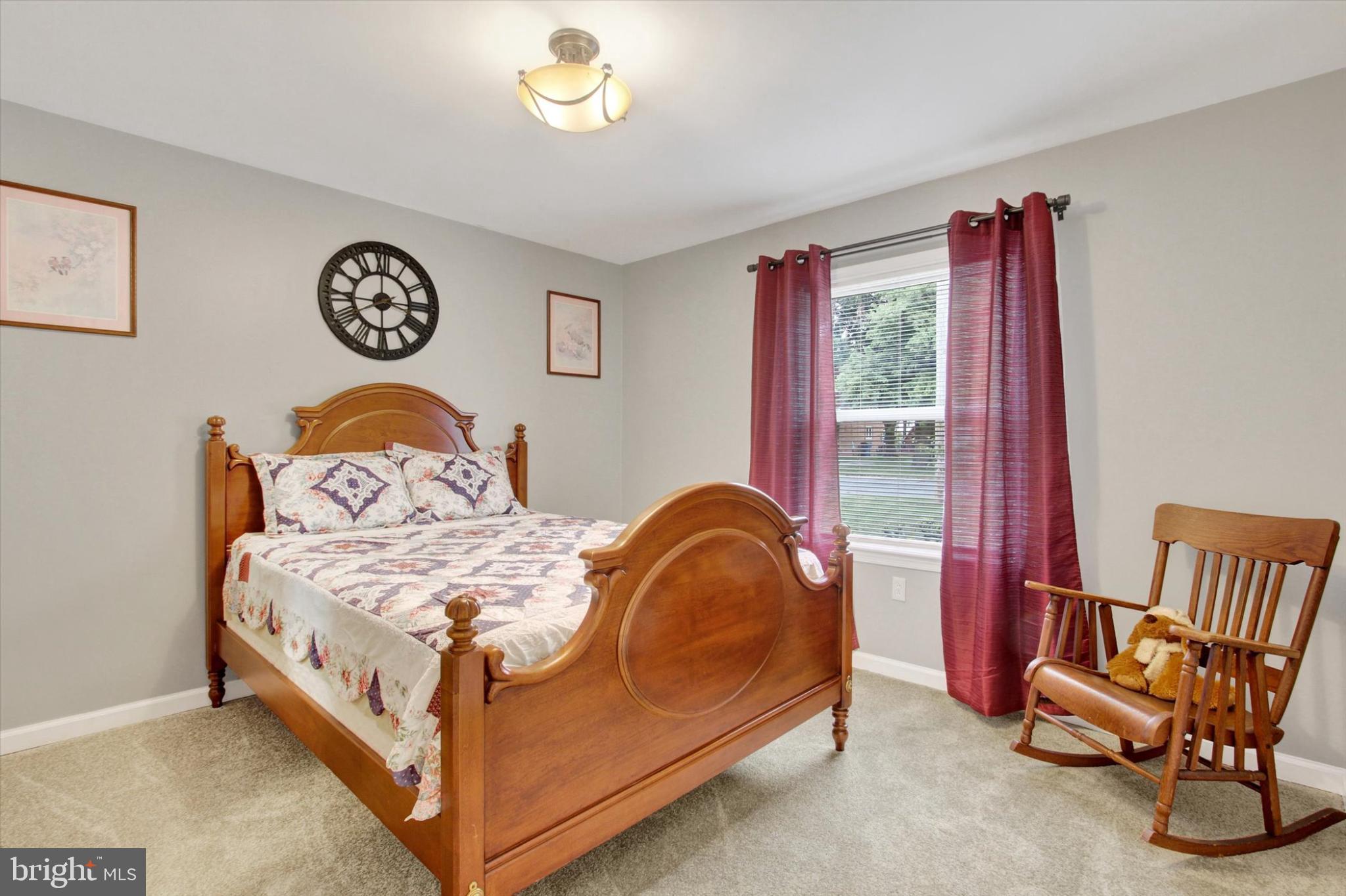 1484 Fire Hall Road Spring Grove, PA 17362 - Photo 11 of 19 a bedroom with a bed and a chair