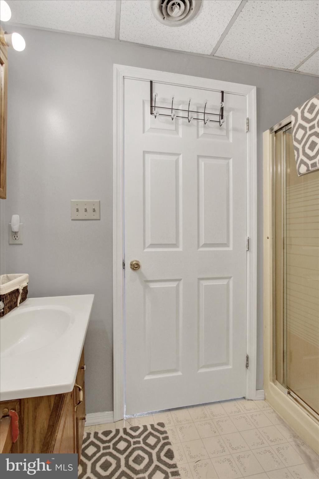 1484 Fire Hall Road Spring Grove, PA 17362 - Photo 15 of 19 a bathroom with a shower and a sink