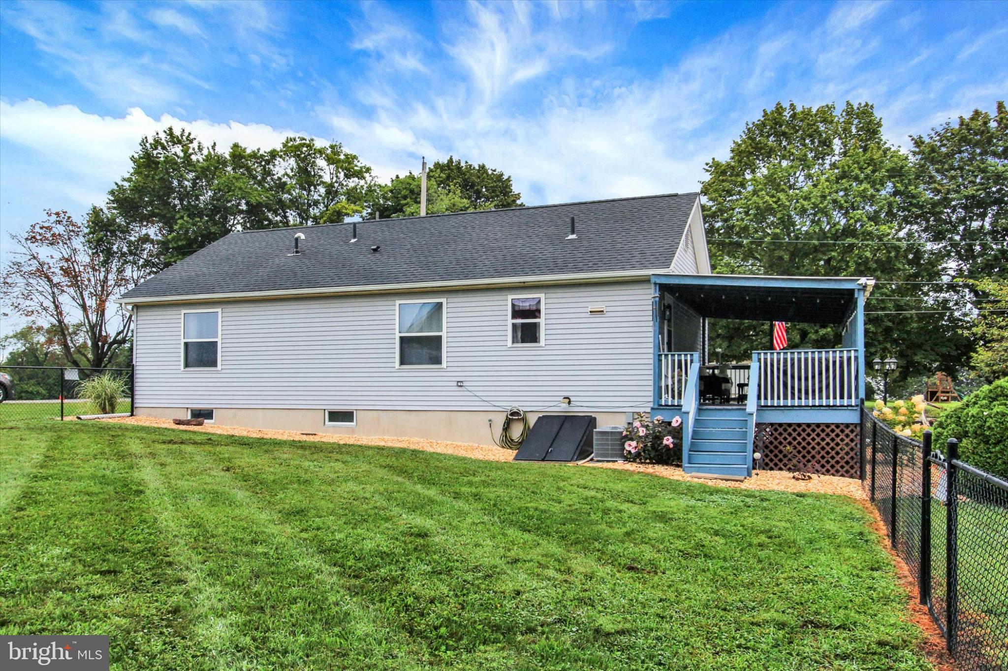 1484 Fire Hall Road Spring Grove, PA 17362 - Photo 18 of 19 a front view of house with yard and outdoor seating