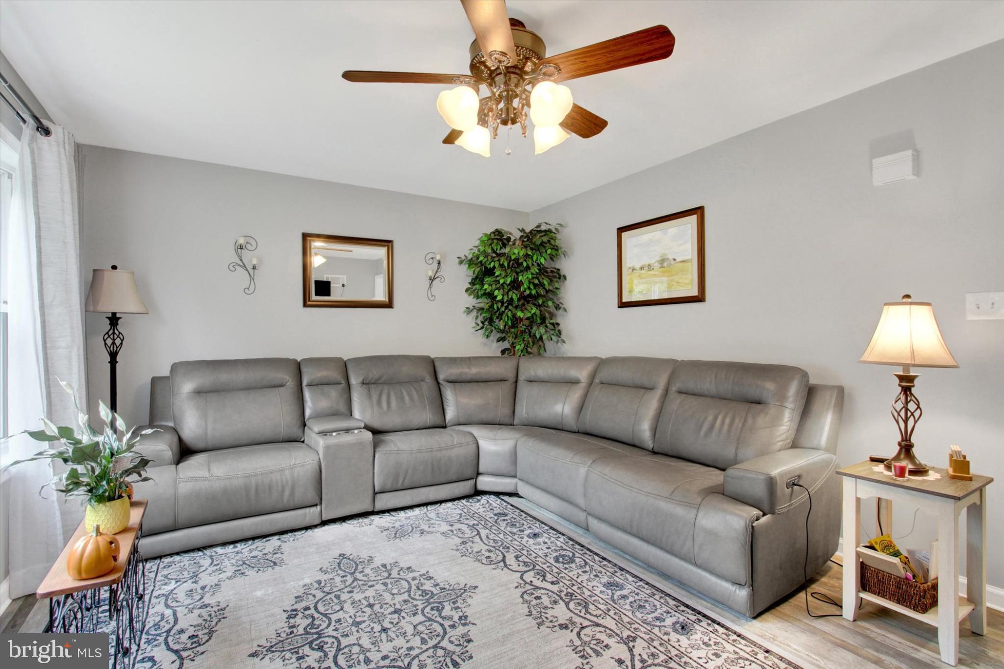 1484 Fire Hall Road Spring Grove, PA 17362 - Photo 4 of 19 a living room with furniture and a lamp