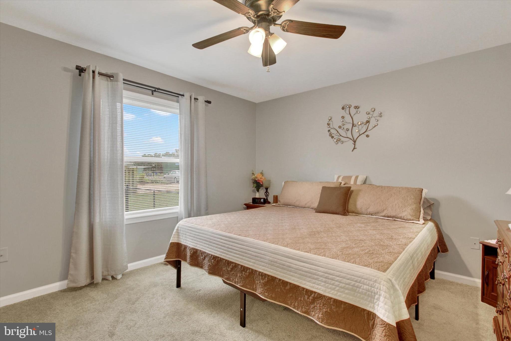 1484 Fire Hall Road Spring Grove, PA 17362 - Photo 10 of 19 a bedroom with a bed and a window