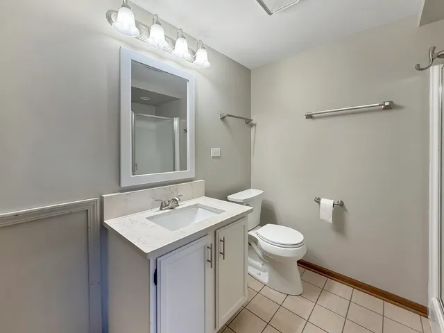 a bathroom with a toilet a sink and a bathtub