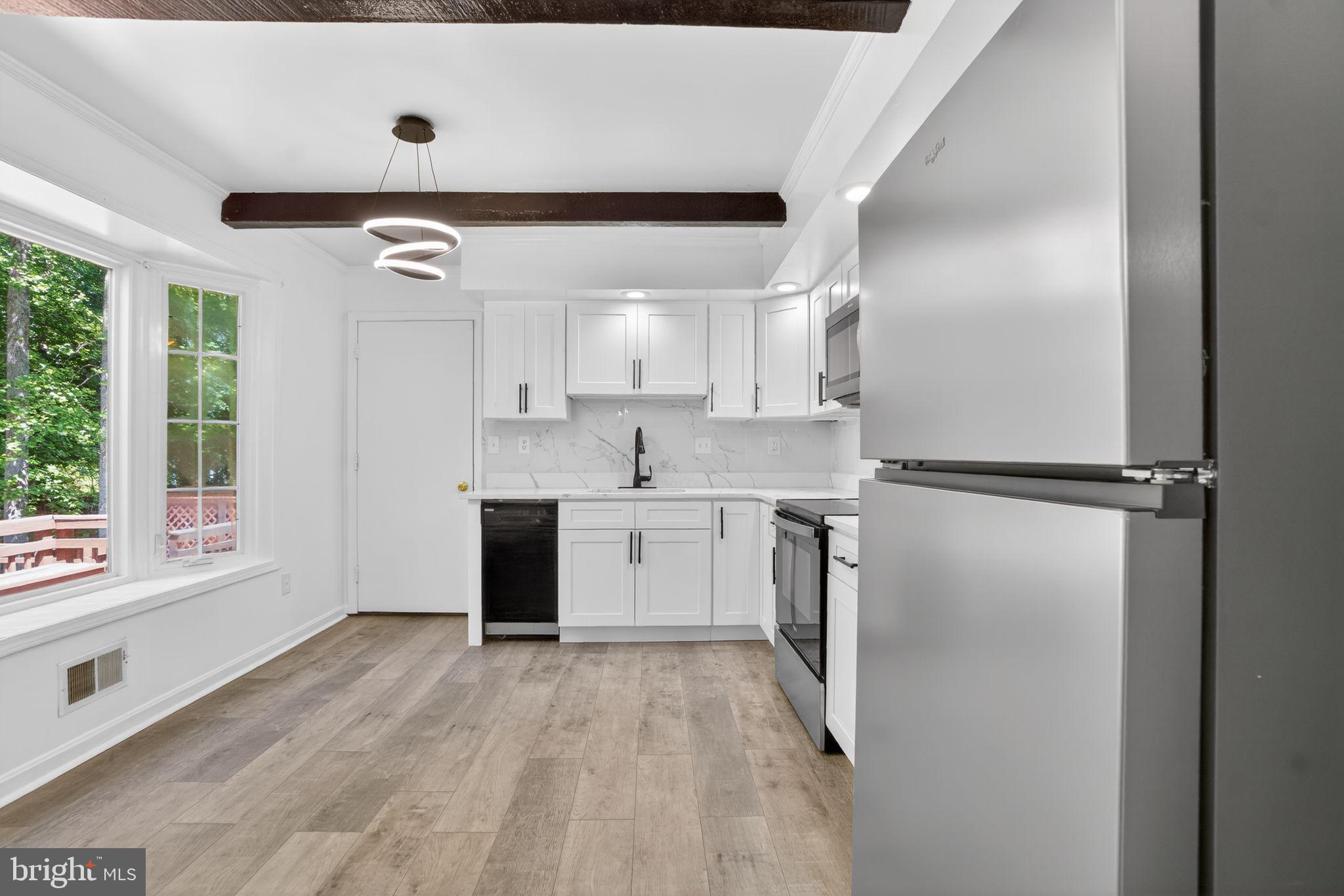 507 Clarks Run Road La Plata, MD 20646 - Photo 6 of 49 Modern kitchen with natural light.