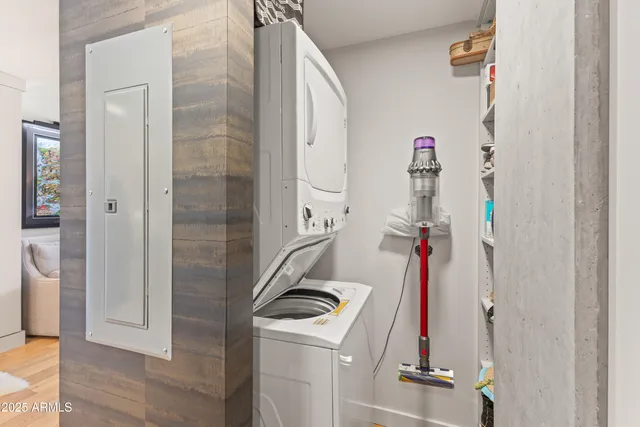a view of a storage & utility room with a sink