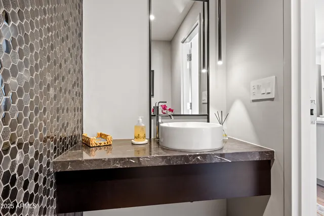 a dining room with table and chairs