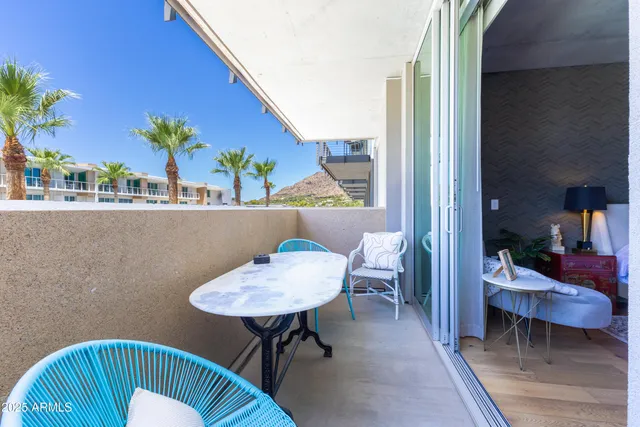 a view of a living room and dining room