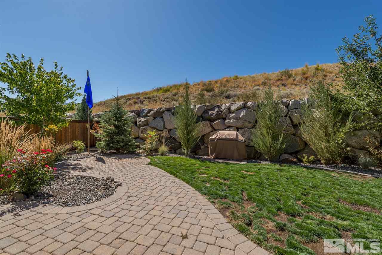 1623 Crescent Pointe Way Reno, NV 89523 - Photo 11 of 24 a view of a road with a building in the background