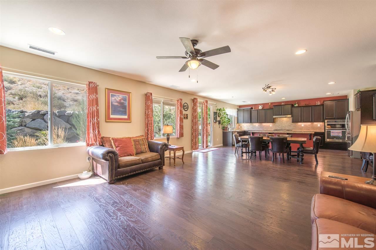 1623 Crescent Pointe Way Reno, NV 89523 - Photo 23 of 24 a living room with furniture and wooden floor