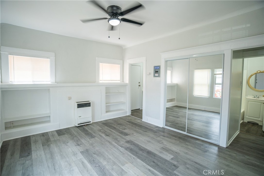1495 Cedar Avenue Long Beach, CA 90813 - Photo 14 of 34 wooden floor in an empty room with a window