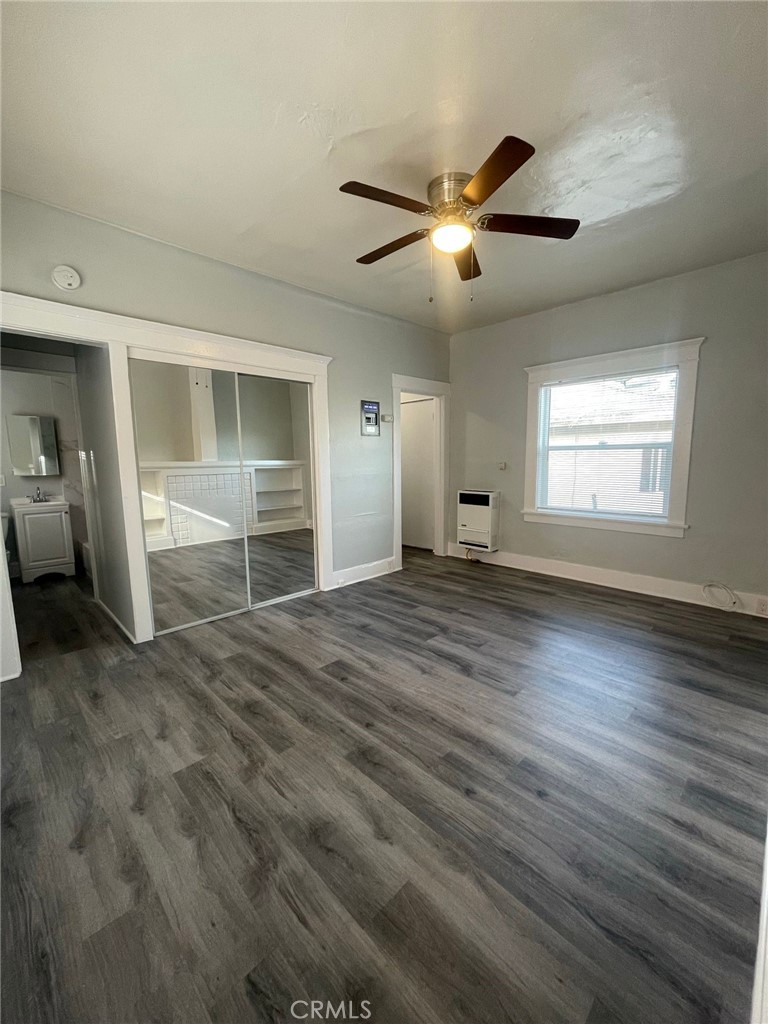1495 Cedar Avenue Long Beach, CA 90813 - Photo 29 of 34 a view of empty room with wooden floor and fan
