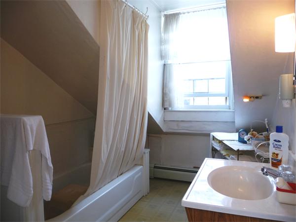 78 Spring Street Cambridge, MA 02141 - Photo 14 of 23 a bathroom with a sink and a mirror