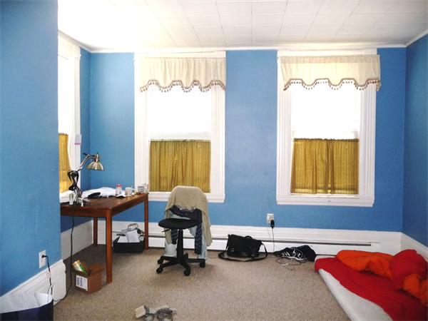 78 Spring Street Cambridge, MA 02141 - Photo 19 of 23 a view of a workspace with furniture and a window