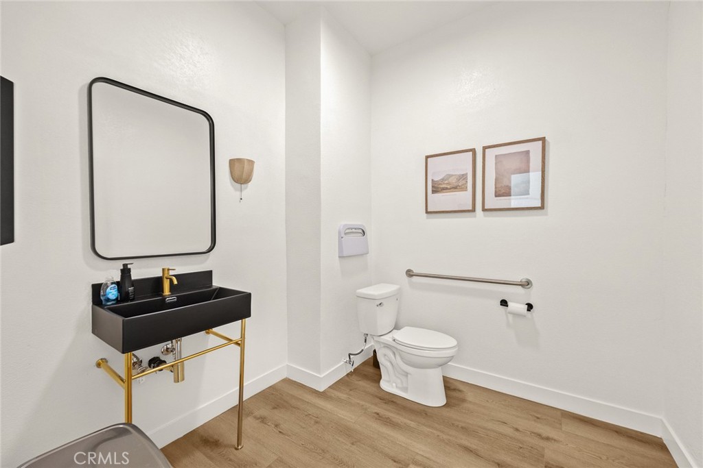 591 Fairview Avenue Arcadia, CA 91007 - Photo 17 of 20 a bathroom with a toilet sink and mirror