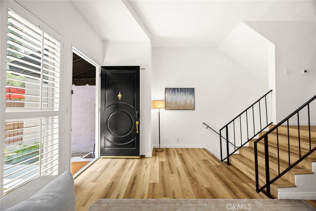 591 Fairview Avenue Arcadia, CA 91007 - Photo 4 of 20 a view of a hardwood & staircase in a room
