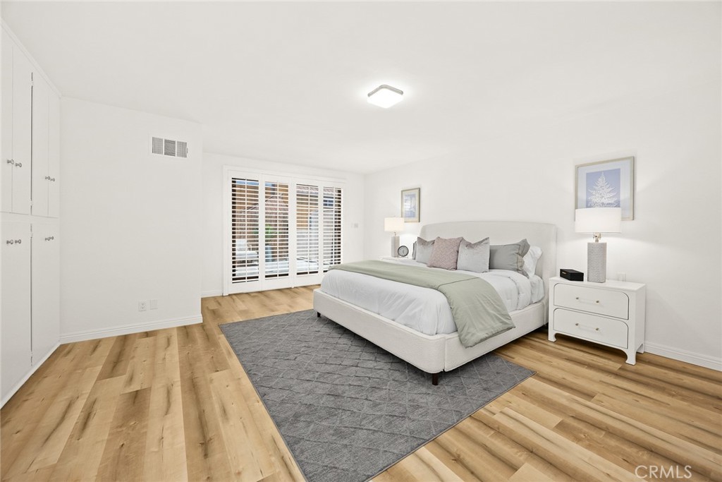 591 Fairview Avenue Arcadia, CA 91007 - Photo 10 of 20 a bedroom with a bed and a large window