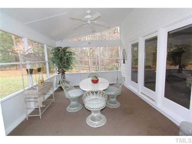 12016 Deer Run Raleigh, NC 27614 - Photo 16 of 23 a dining room with furniture and large windows