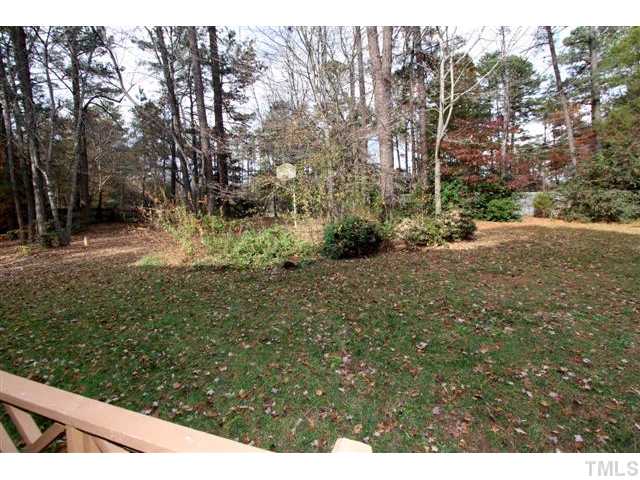 12016 Deer Run Raleigh, NC 27614 - Photo 21 of 23 a view of a yard with plants and trees