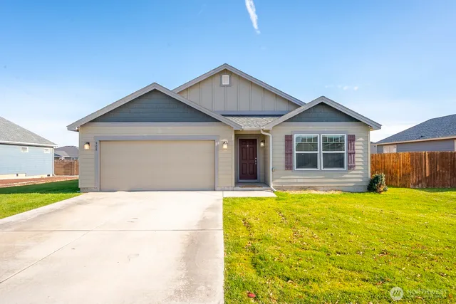 a house view with a garden space