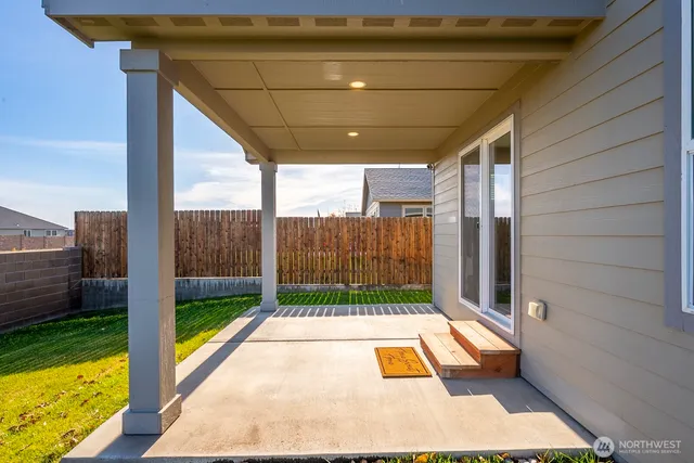 a view of a swimming pool with an ocean view