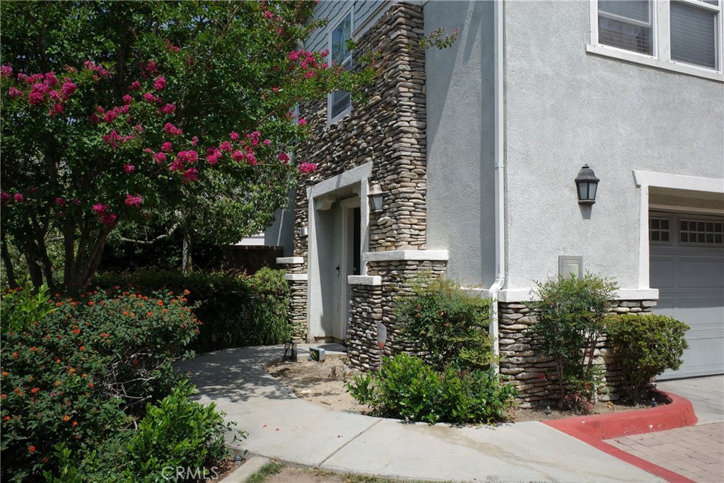 7331 Shelby Place Rancho Cucamonga, CA 91739 - Photo 3 of 17 a house view with a outdoor space