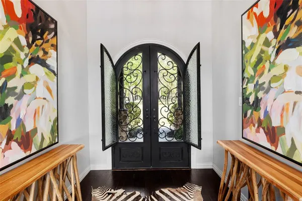 a small pool with lawn chairs in the backyard