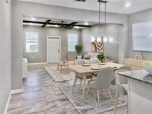 a view of a livingroom with furniture and window