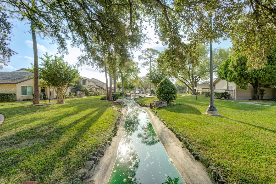12339 South Dairy Ashford Road, Unit 2339 Houston, TX 77099 - Photo 3 of 19 Take a morning walk around this man made stream
