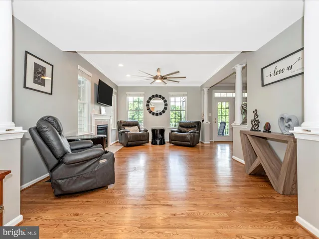 a view of an entryway with wooden floor