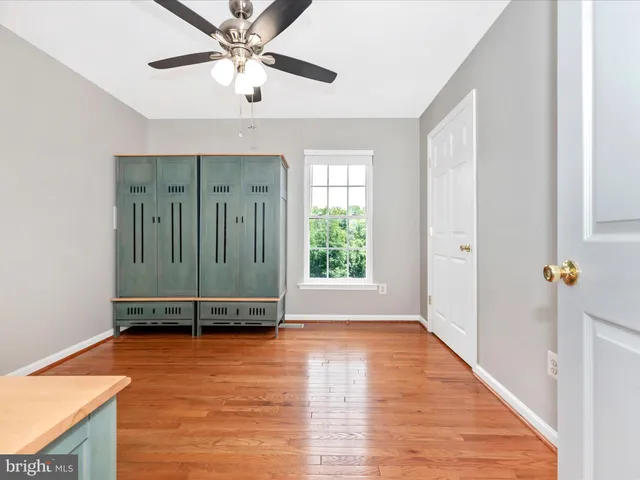 a bedroom with furniture and a fireplace