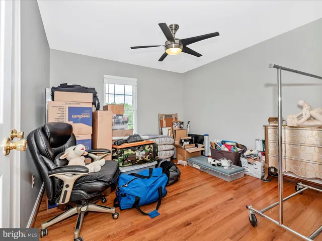a bathroom with a toilet sink and shower