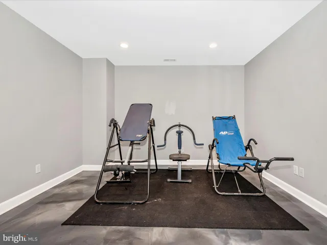 an aerial view of a house with swimming pool garden view and a trees