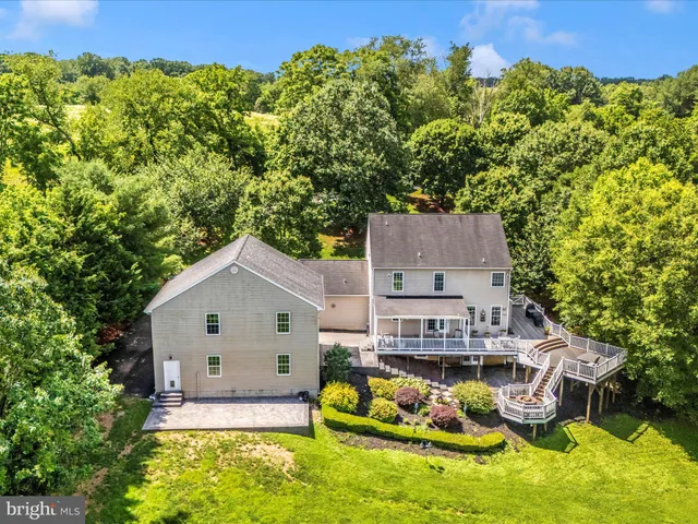 a garage with a white stove and a chandelier