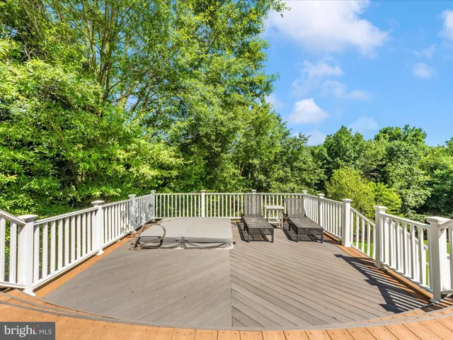 a view of a chairs and table on the wooden floor