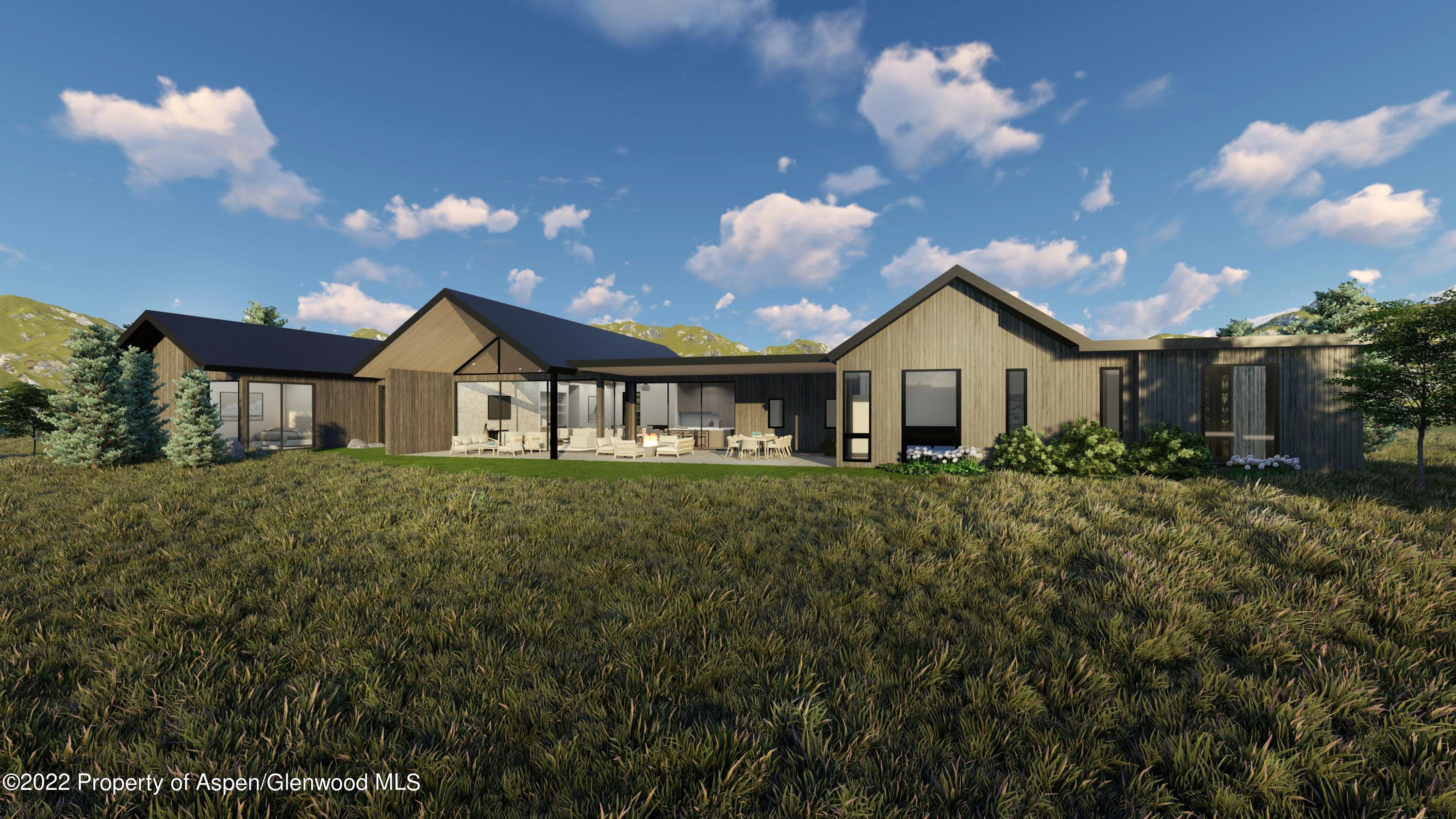 34 St Finnbar Farm Road Carbondale, CO 81623 - Photo 11 of 12 a front view of a house with a yard and garage