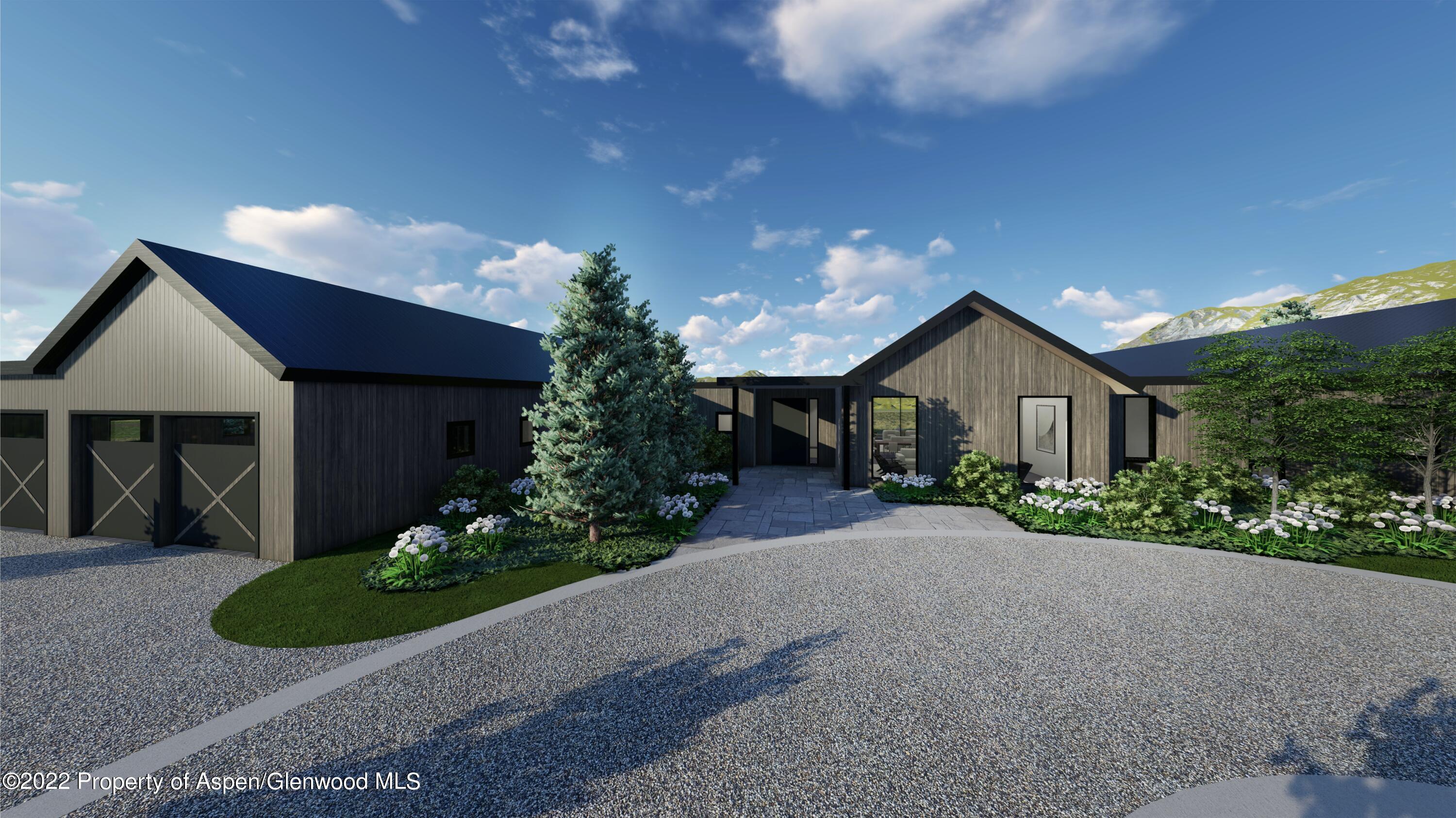 34 St Finnbar Farm Road Carbondale, CO 81623 - Photo 12 of 12 a front view of a house with a yard and garage