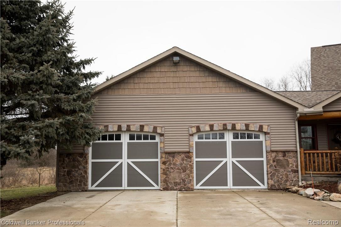 1968 East Beard Road Perry, MI 48872 - Photo 4 of 37 Large 2-1/2 car attached garage.
