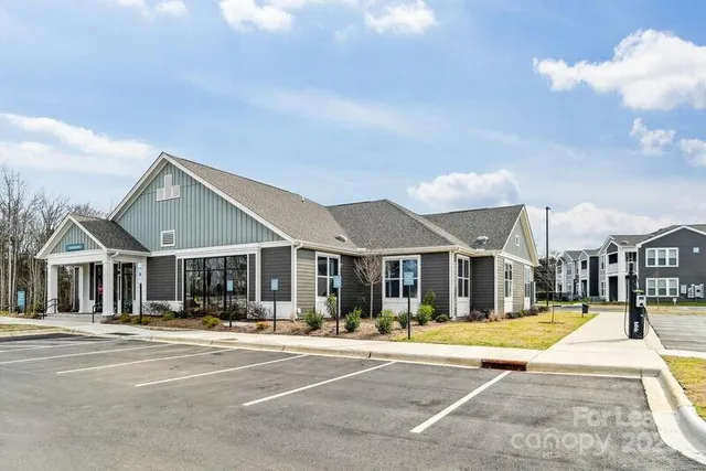 a view of a large white house