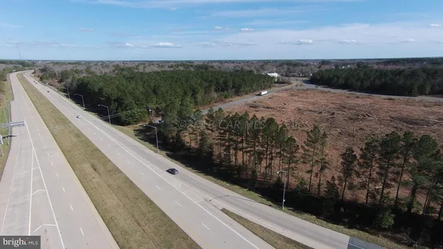 a view of a road with a yard