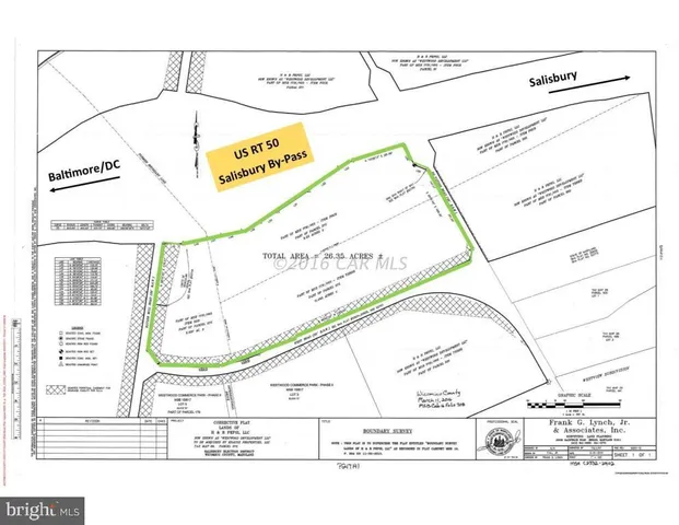 a view of a street with an apartment building