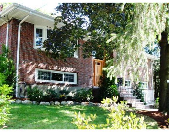 2 Wickham Road Winchester, MA 01890 - Photo 1 of 16 a front view of a house with a yard