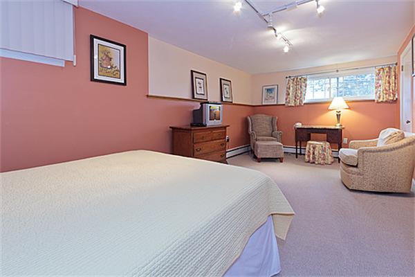 2 Wickham Road Winchester, MA 01890 - Photo 15 of 16 a bedroom with a bed and wooden floor