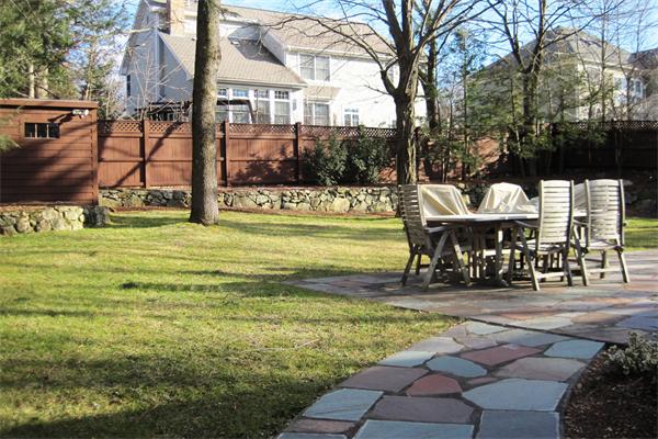 2 Wickham Road Winchester, MA 01890 - Photo 4 of 16 a view of a swimming pool with a patio