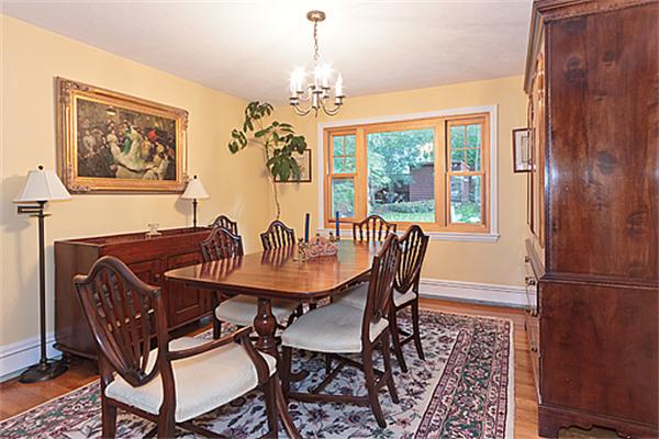 2 Wickham Road Winchester, MA 01890 - Photo 9 of 16 a dining room with furniture a chandelier and window