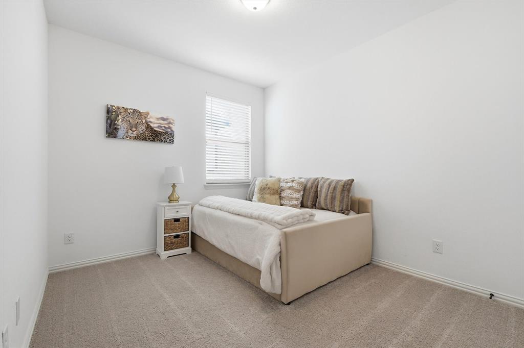 2331 Jack Rabbit Way Northlake, TX 76247 - Photo 24 of 39 a room with a bed and a window
