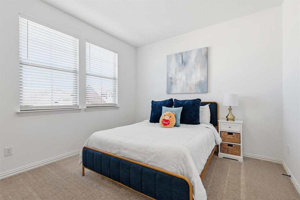 2331 Jack Rabbit Way Northlake, TX 76247 - Photo 26 of 39 a bedroom with a bed and window