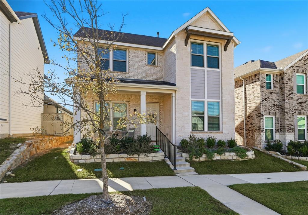 2331 Jack Rabbit Way Northlake, TX 76247 - Photo 3 of 39 a front view of a house with a yard