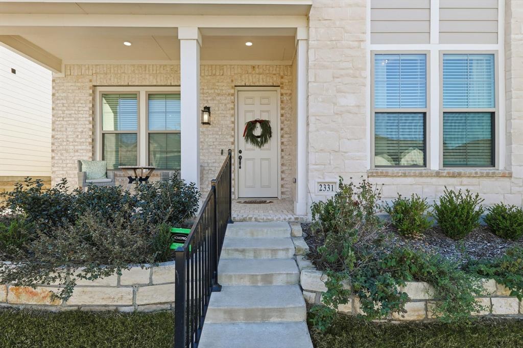 2331 Jack Rabbit Way Northlake, TX 76247 - Photo 4 of 39 a front view of a house with a garden