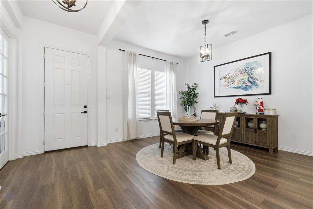 2331 Jack Rabbit Way Northlake, TX 76247 - Photo 5 of 39 a view of a dining room with furniture window and wooden floor