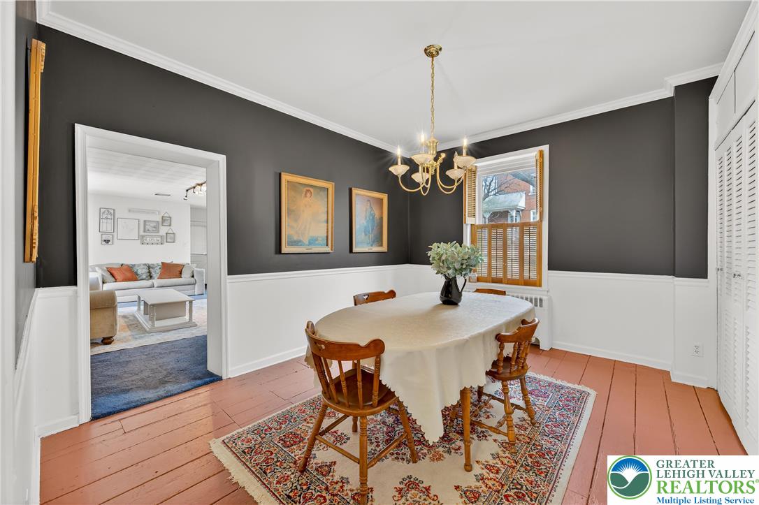 945 Main Street Bethlehem, PA 18018 - Photo 22 of 75 a view of a dining room with furniture and wooden floor