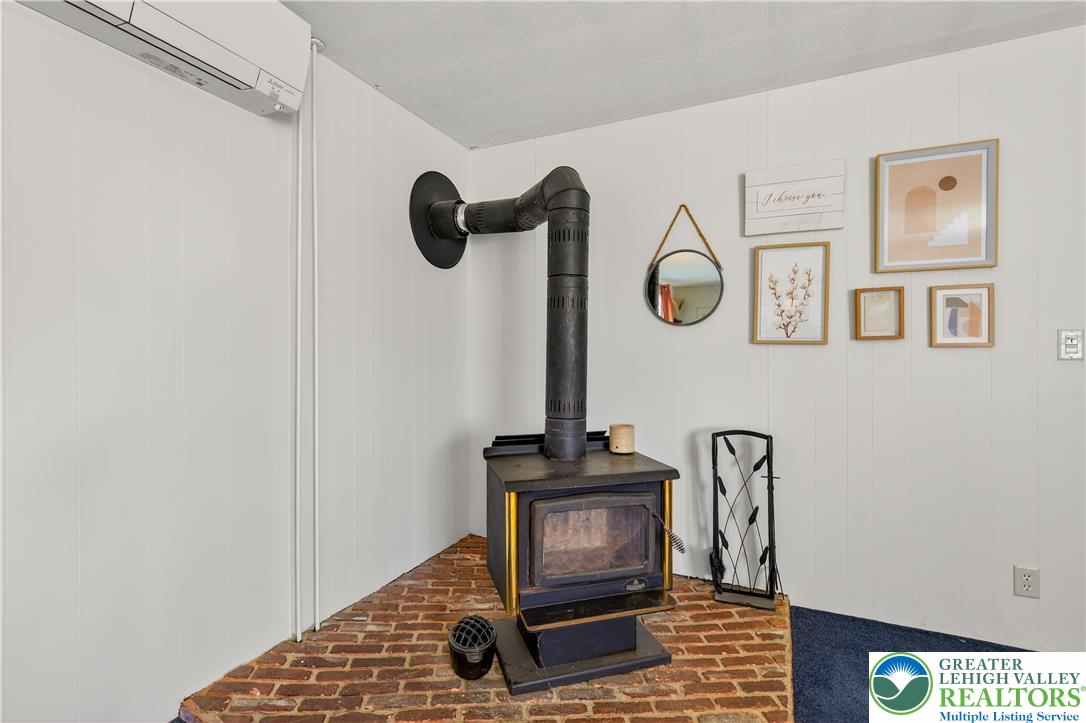 945 Main Street Bethlehem, PA 18018 - Photo 27 of 75 a view of a storage and utility room with racks on the wall